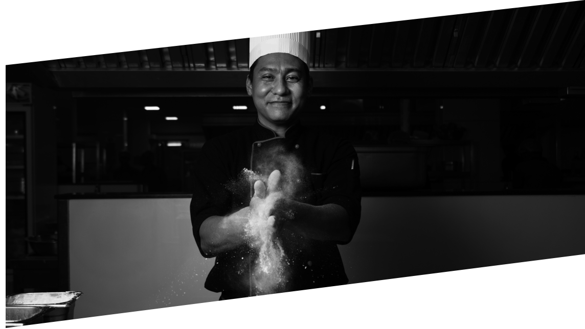 a chef preparing food with smiling face