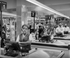 four employees standing in the billing section