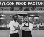 sylcon employees standing in front of food factory